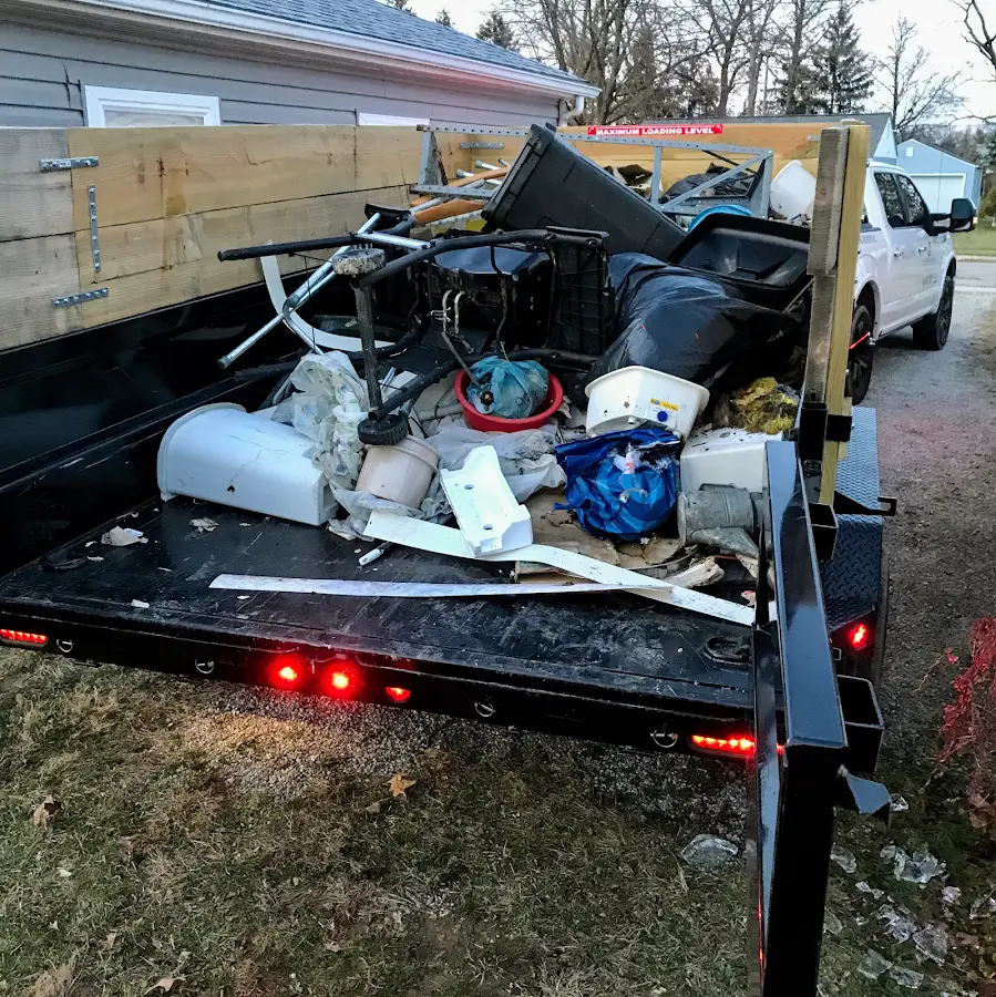 Roll-off dumpster delivered to a residential driveway in Oswego